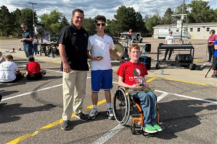 Superintendent Christopher Smith with Nolan Dauer and Donovan Light